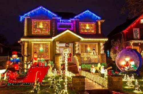 house with solar Christmas lights