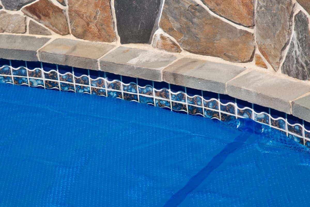 do solar pool covers prevent evaporation